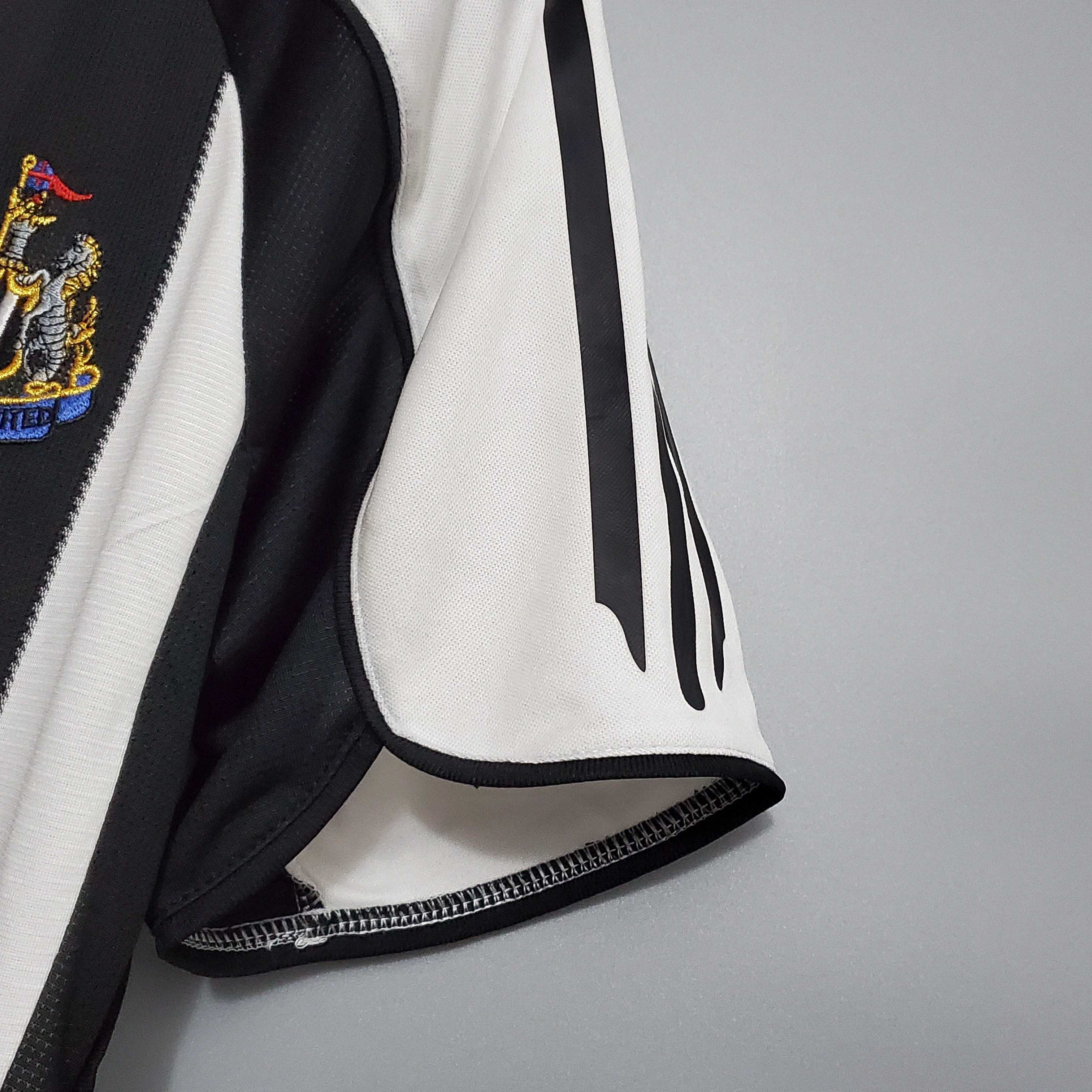 CAMISA NEWCASTLE RETRÔ HOME 05/06