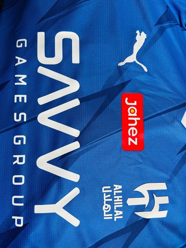 CAMISA AL HILAL HOME 2023/24 AZUL MASCULINA + CHAVEIRO ESPECIAL DE BRINDE