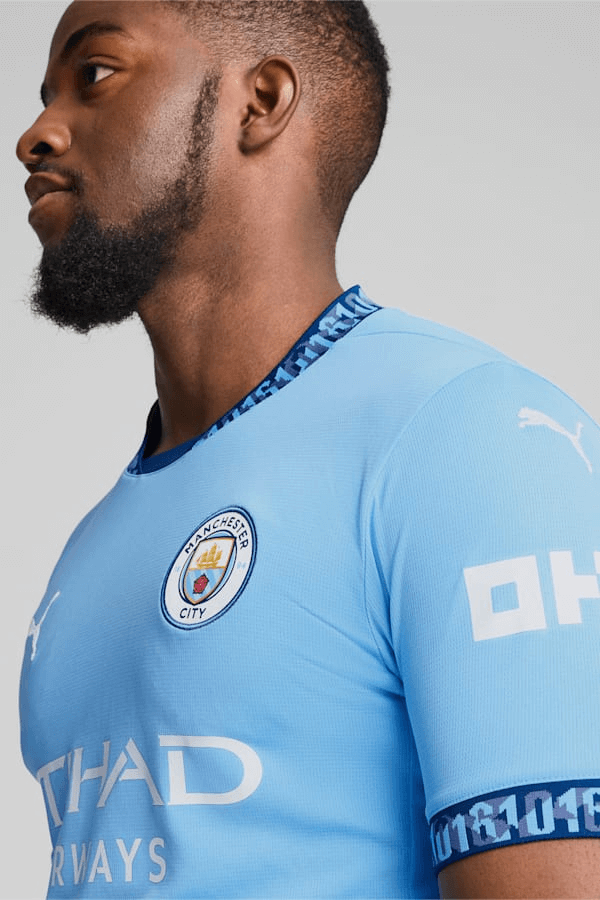 CAMISA MANCHESTER CITY I HOME 2024/25 TORCEDOR