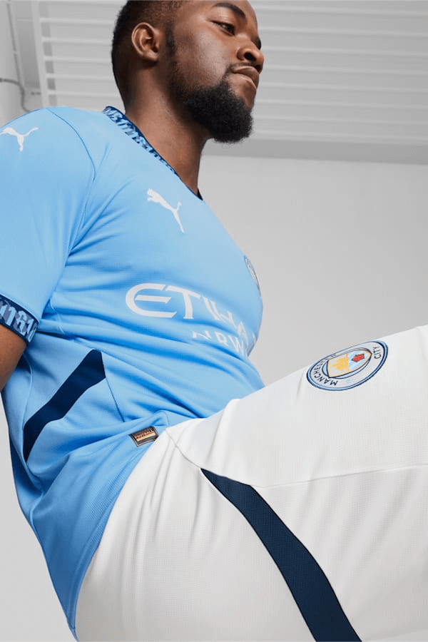 CAMISA MANCHESTER CITY I HOME 2024/25 TORCEDOR