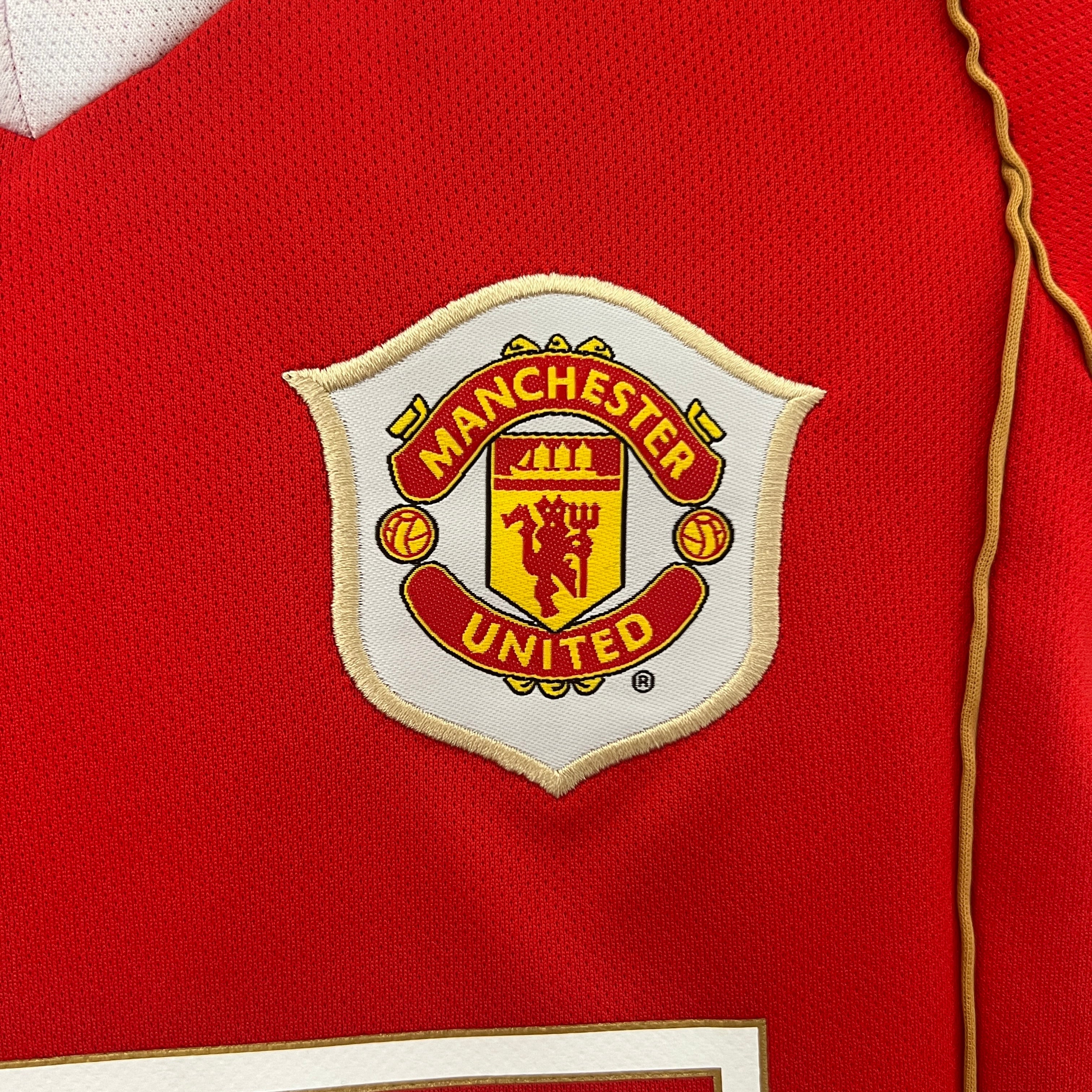KIT INFANTIL RETRÔ MANCHESTER UNITED HOME 06/07