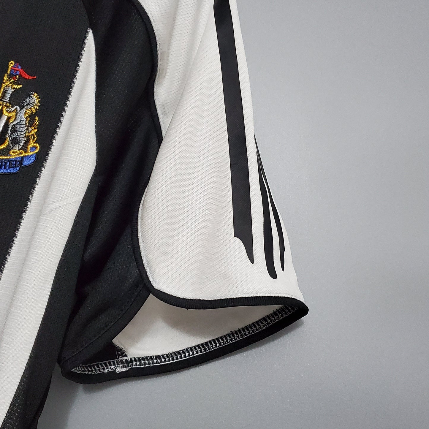 CAMISA NEWCASTLE RETRÔ HOME 05/06