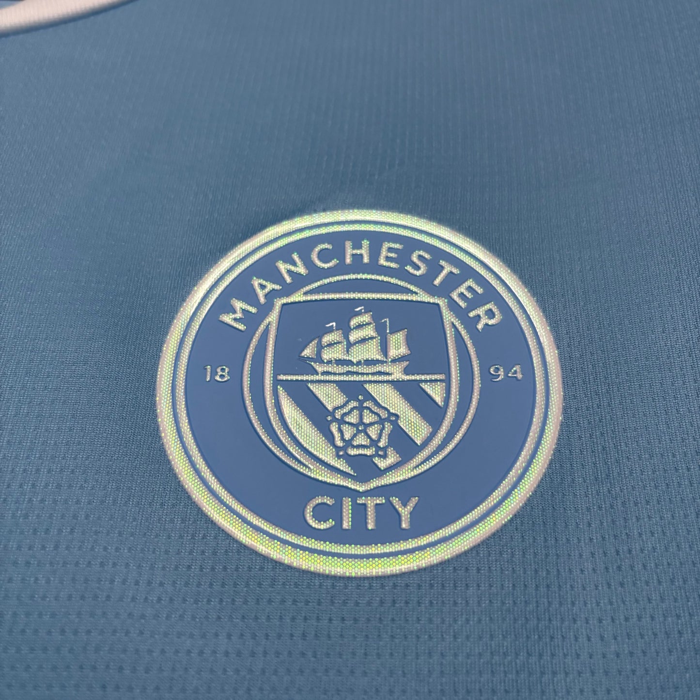 CAMISA MANCHESTER CITY I TITULAR 2026/27 TORCEDOR