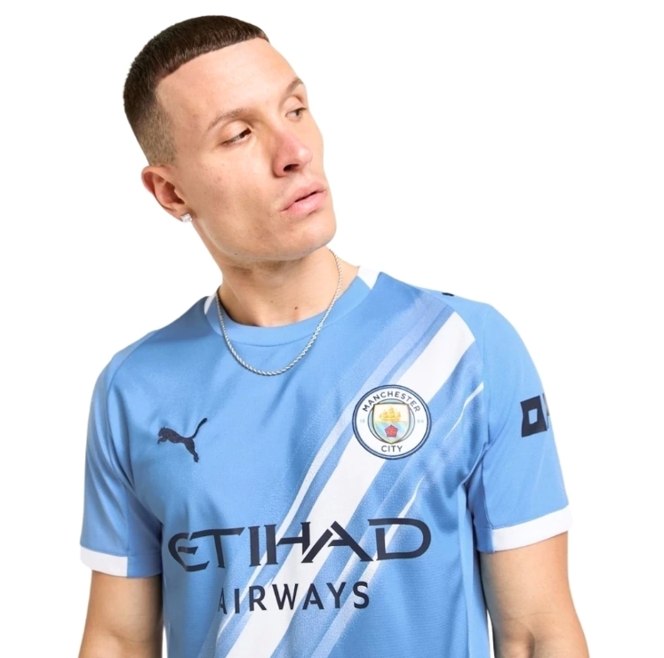 CAMISA MANCHESTER CITY I TITULAR 2025/26 TORCEDOR