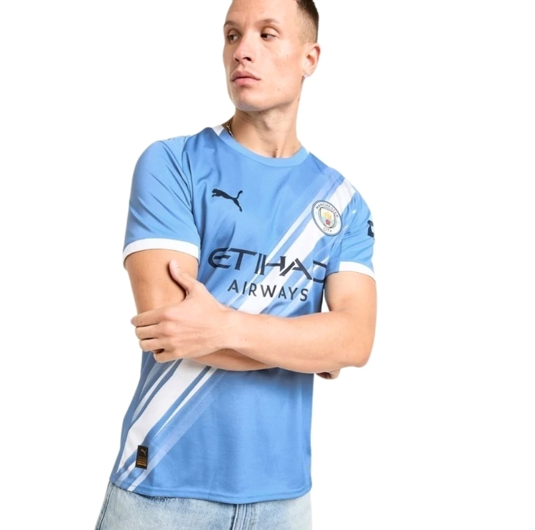 CAMISA MANCHESTER CITY I TITULAR 2025/26 TORCEDOR