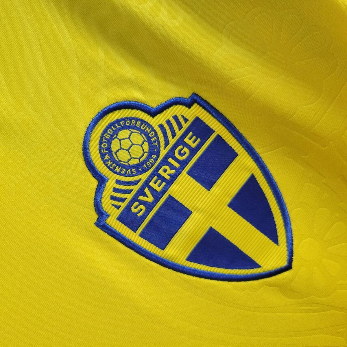 CAMISA SUÉCIA I 2026/27 TORCEDOR COPA DO MUNDO