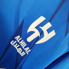 CAMISA AL HILAL HOME 2023/24 AZUL MASCULINA + CHAVEIRO ESPECIAL DE BRINDE