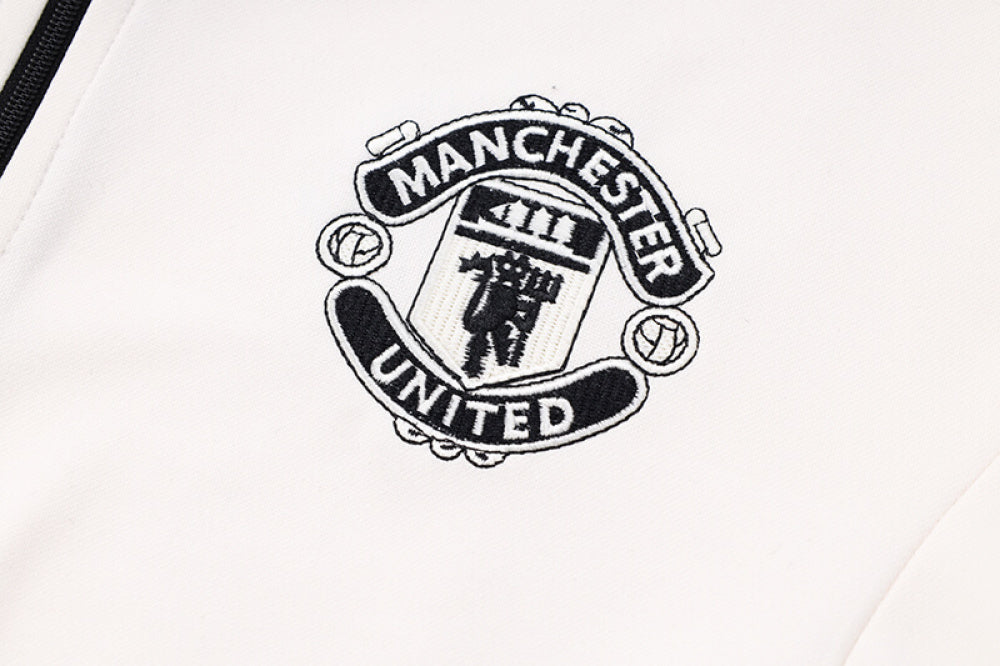 AGASALHO MANCHESTER UNITED TREINO 2023/24 BRANCO/AZUL