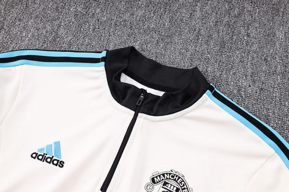 AGASALHO MANCHESTER UNITED TREINO 2023/24 BRANCO/AZUL
